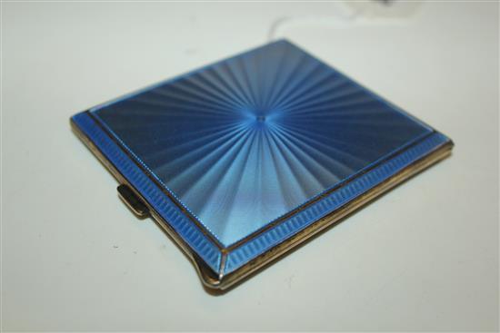 Silver cigarette case with blue guilloche enamel sunburst decoration, Birmingham 1945